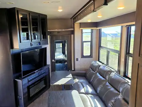 Living room wall with mounted 50-inch TV